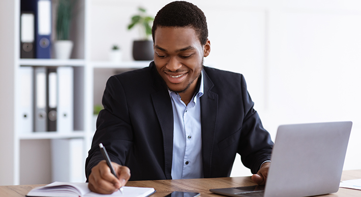 male working at a laptop